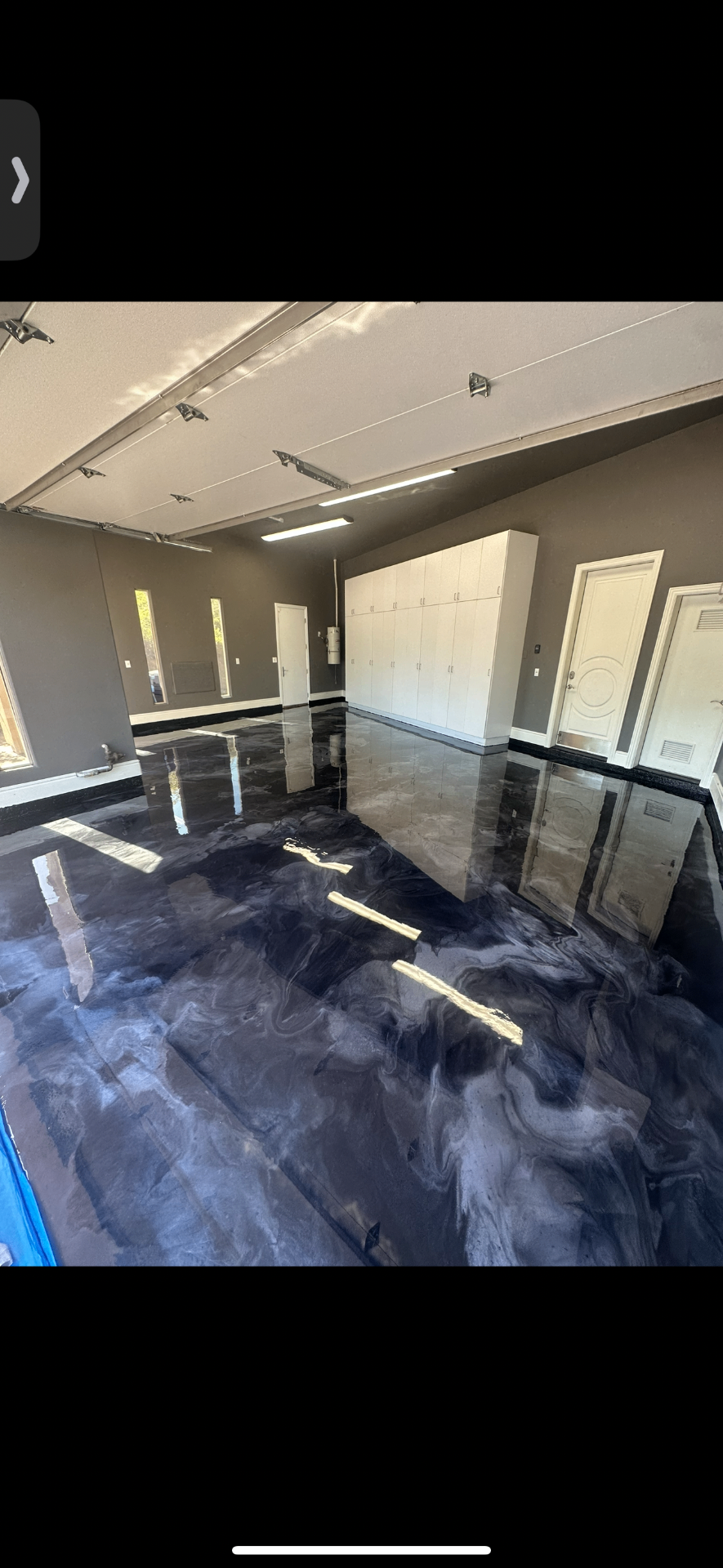 Smoky black and silver metallic garage floor coating